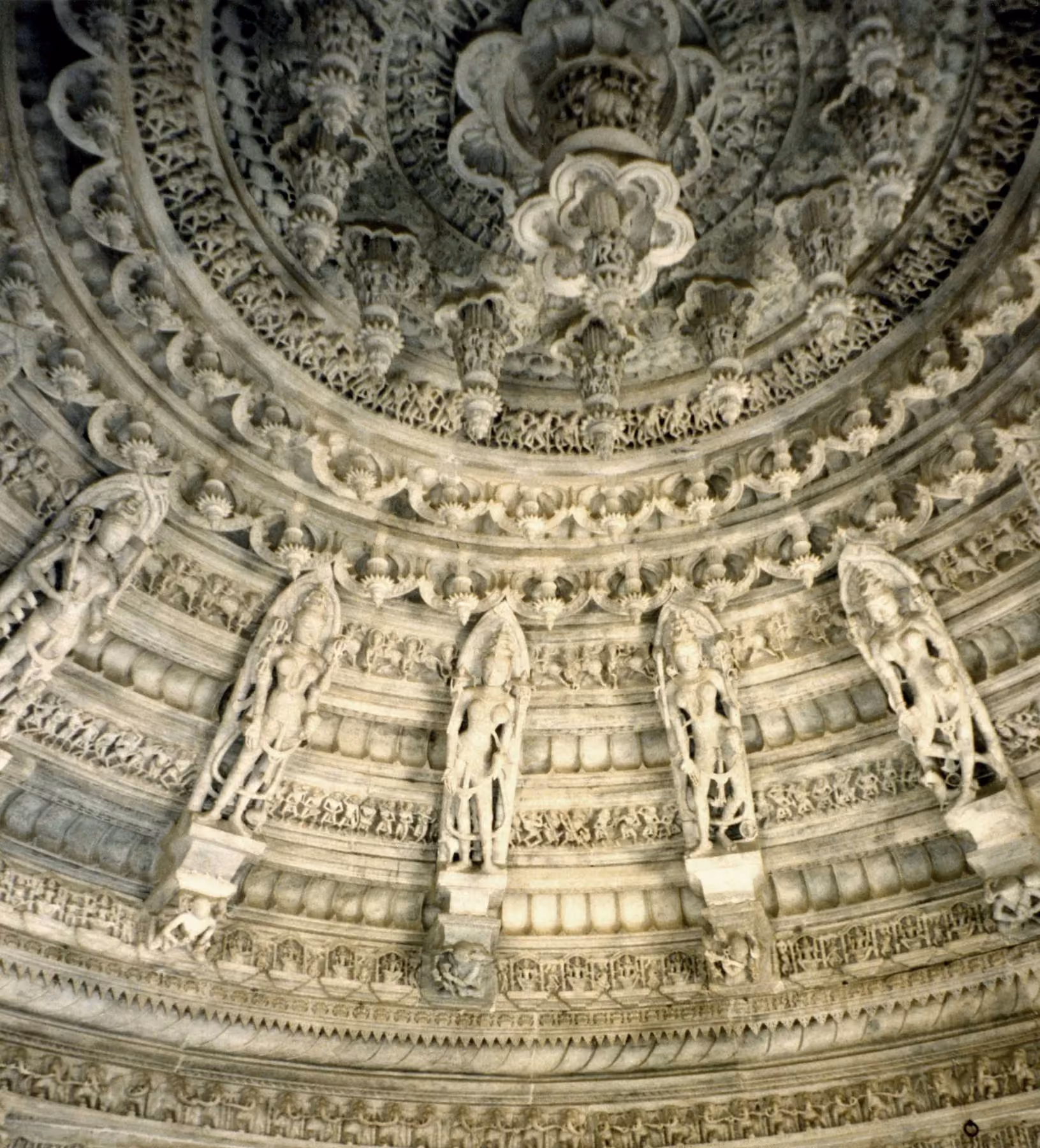 A dense concentric marble ceiling medallion in the Dilwara Jain temples at Mount Abu